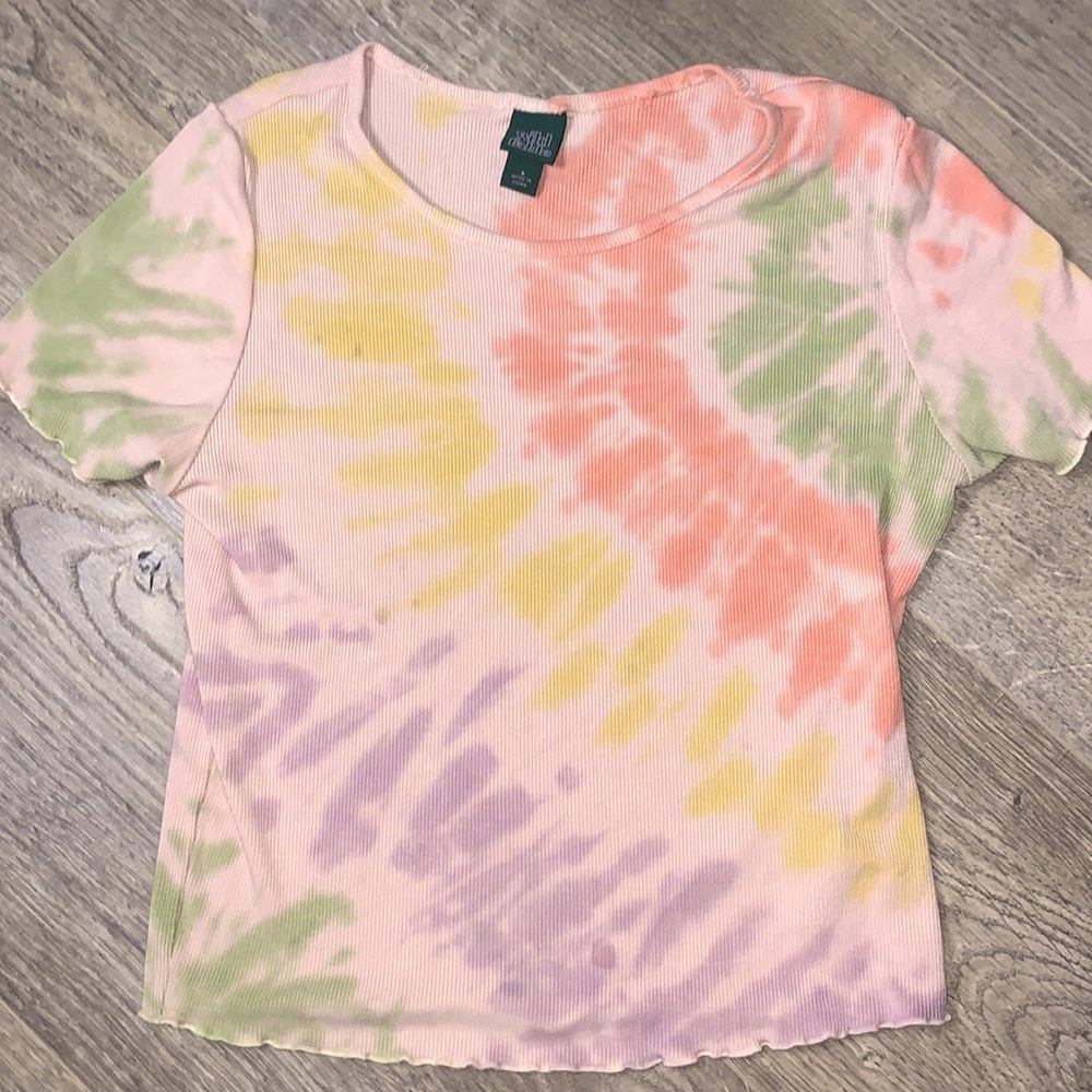 The top is multi colored. It is from wild fable. It is also very soft.